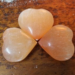 Selenite Orange Heart Palm Stones x 3