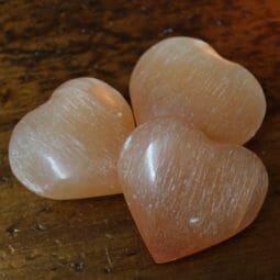 Selenite Orange Heart Palm Stones x 3