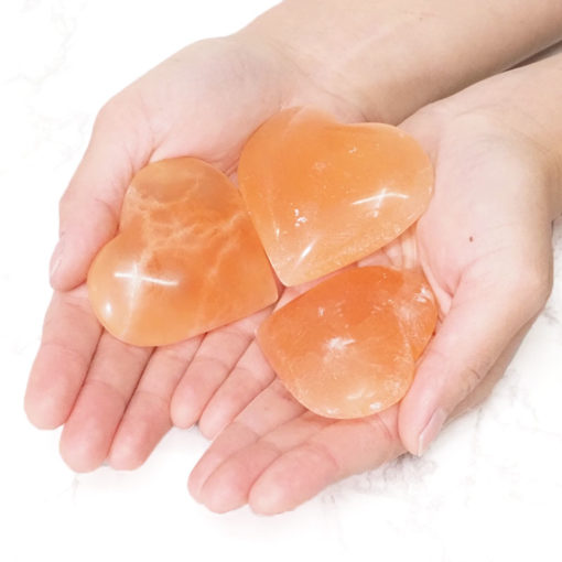 Orange Selenite Heart Palm Stone Set 3 | Himalayan Salt Factory