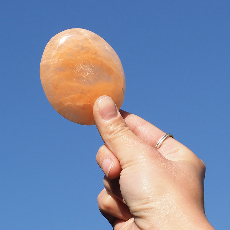 Orange Selenite Oval Palm Stones Set 3 4 Orange Selenite Oval Palm Stone Set 3 | Himalayan Salt Factory