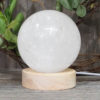 0.76kg Clear Quartz Polished Sphere with LED Light Small Display Base DS1310 1 0.76kg Clear Quartz Polished Sphere with LED Light Small Display Base DS1310