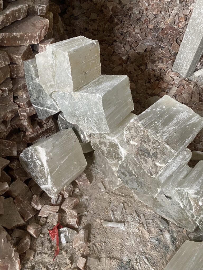How We Travel the World to Source Our Crystals - Morocco 2024 15 Stacked selenite blocks showing natural crystal striations