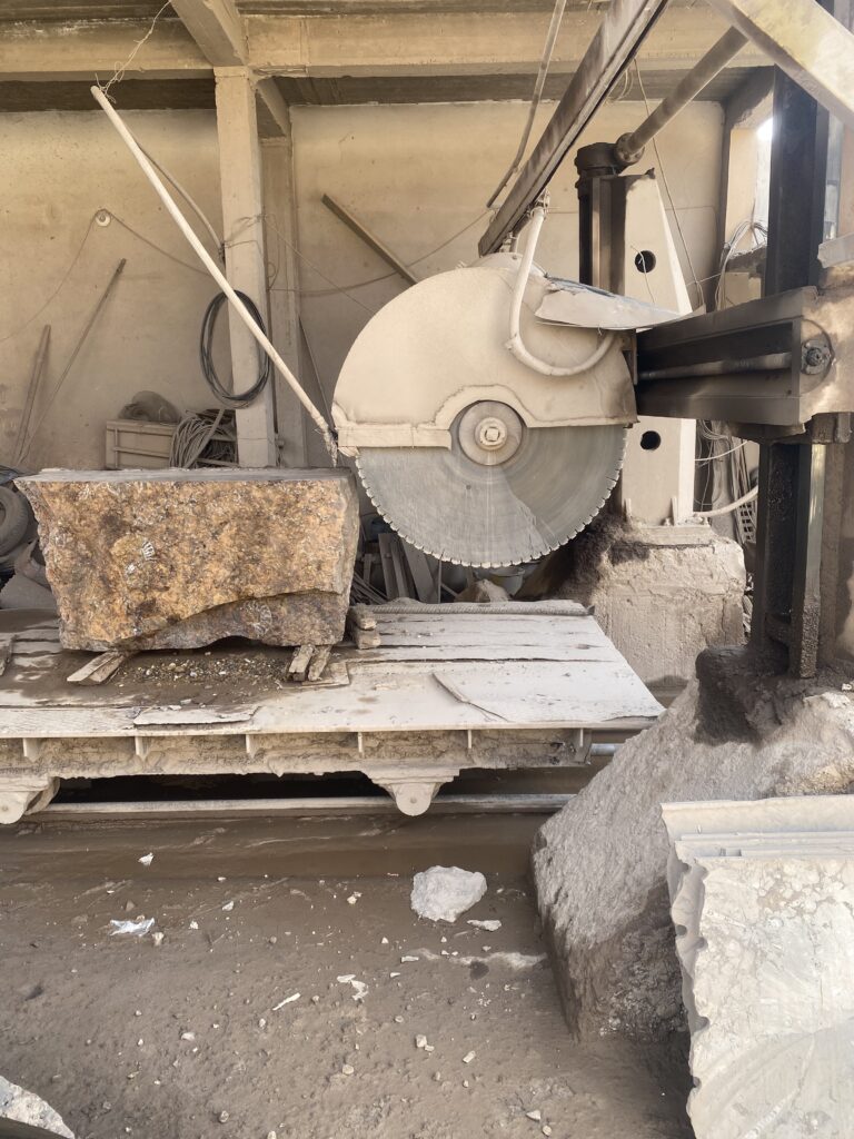 How We Travel the World to Source Our Crystals - Morocco 2024 9 Enormous blocks of Orthoceras and fossil limestone being cut at a Moroccan workshop