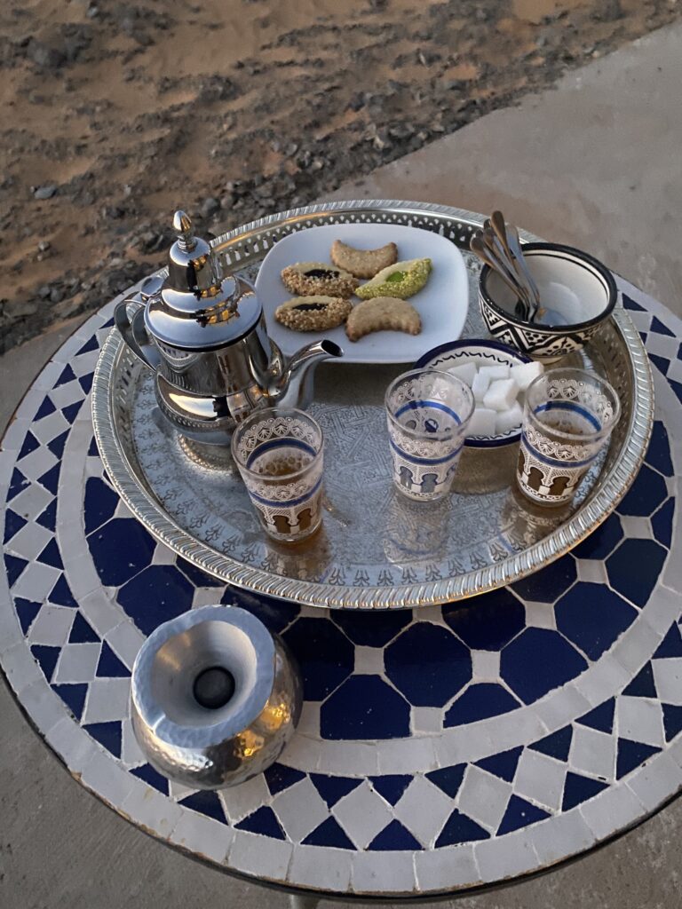 How We Travel the World to Source Our Crystals - Morocco 2024 22 Traditional Moroccan mint tea served in ornate glasses